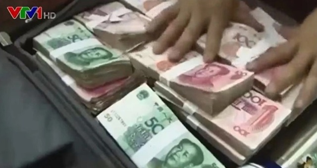 Trung Quốc xem xét tăng hình phạt tội đưa hối lộ - Ảnh 1.