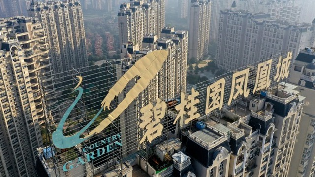 Thêm một tập đoàn bất động sản Trung Quốc nguy cơ vỡ nợ - Ảnh 1.