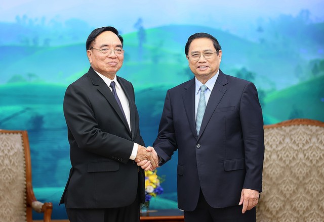 Thủ tướng Phạm Minh Chính tiếp Bộ trưởng Bộ Kế hoạch và Đầu tư Lào - Ảnh 1.