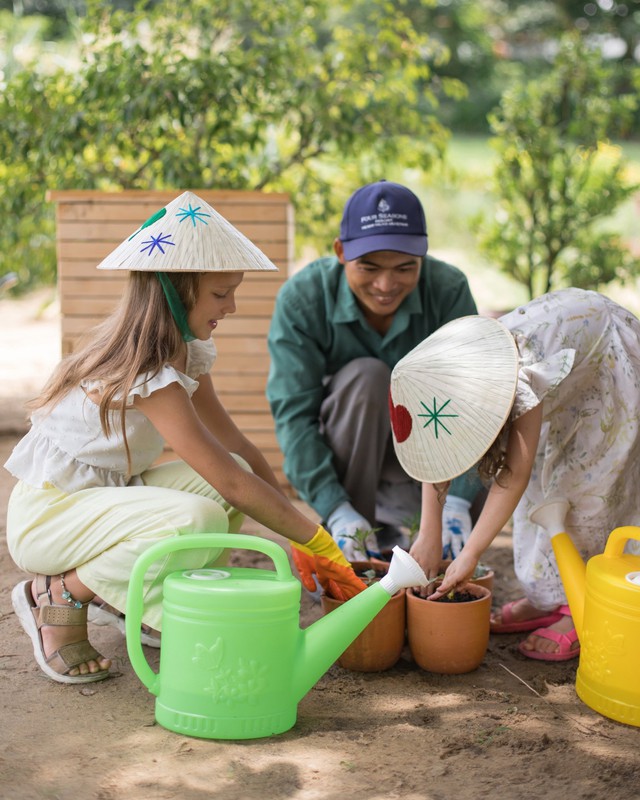 
Experience gardening and composting right in the lush green garden of Four Seasons The Nam Hai, Hoi An.
