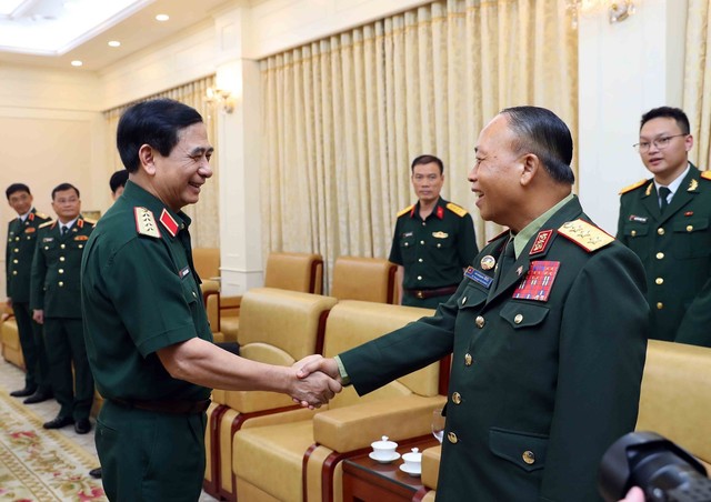 Tăng cường hợp tác quốc phòng Việt Nam - Lào - Ảnh 1.