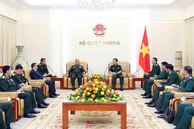 Tăng cường hợp tác quốc phòng Việt Nam - Lào - Ảnh 2.
