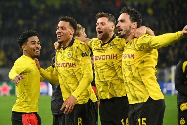 Kết quả lượt về vòng 1/8 Champions League: Atletico Madrid và Dortmund giành vé ngoạn mục   - Ảnh 1.