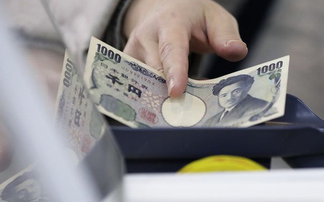 Đồng Yen áp sát mức thấp của 4 tháng so với đồng USD - Ảnh 1.
