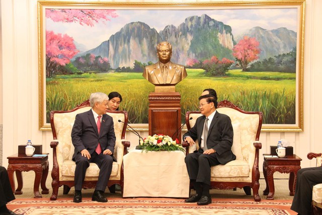 Tổng Bí thư, Chủ tịch nước Lào tiếp Chủ tịch Ủy ban Trung ương MTTQ Việt Nam - Ảnh 1.