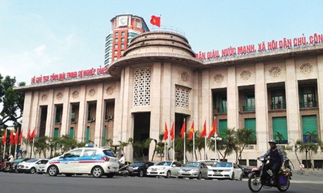 The State Bank of Vietnam next year will issue a new mechanism to manage the foreign exchange rate more flexibly to comply with changes on the global market.(Source :VNA)