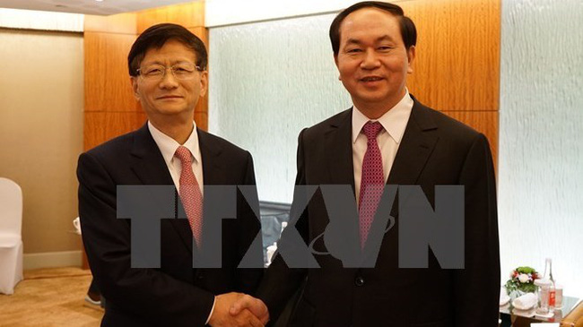 Minister of Public Security Tran Dai Quang (right) and Secretary of the Chinese Party Committee’s Commission for Political and Legal Affairs Meng Jianzhu (Source: VNA)