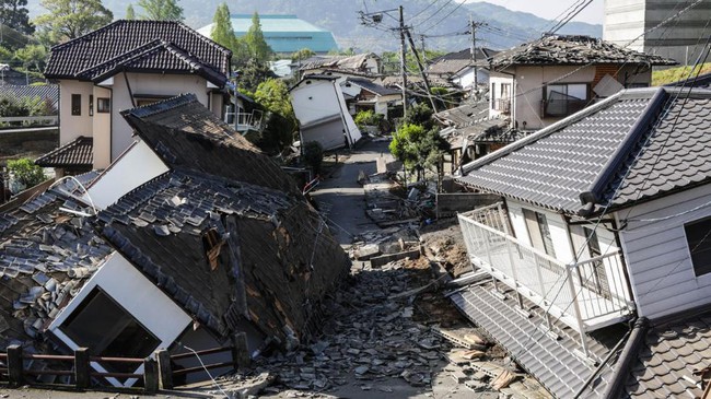 Houses are destroyed after a 7.0 magnitude earthquake hit Kumamoto, Japan on April 16, 2016. The day after a 6.2 magnitude foreshock on April 14, the Kumamoto prefecture was struck again.  (Taro Karibe/Getty Images)