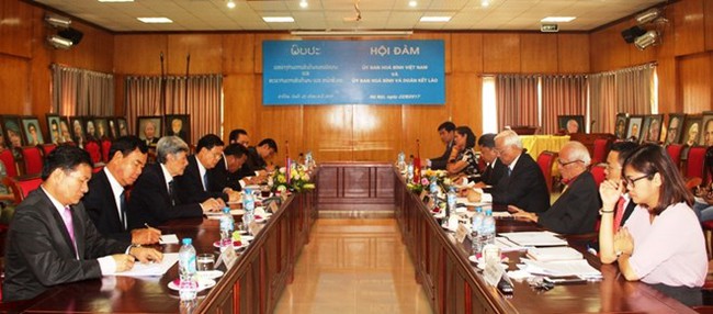 The talks between the Peace Committee of Vietnam and the Committee for Peace and Solidarity of Laos on August 22 (Photo: dangcongsan.vn)