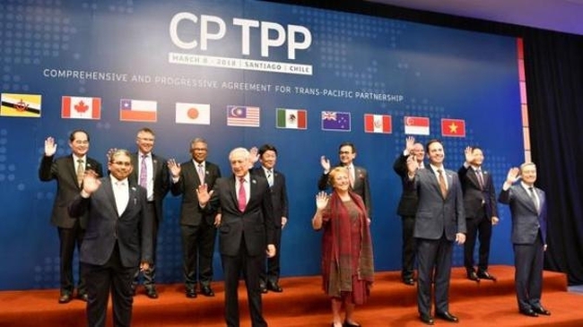 Representatives from 11 member countries gather in Santiago, Chile to sign the CPTPP trade pact. (Credit: Nikkei)