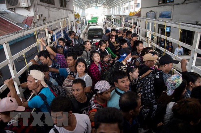Foreign migrant workers in Thailand (Photo: AFP/VNA)