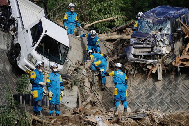 Rescuers continue to search for survivors in Kumano town, Hiroshima prefecture, as dozens of people remain missing. Photo: AP(Kota Endo/Kyodo News)