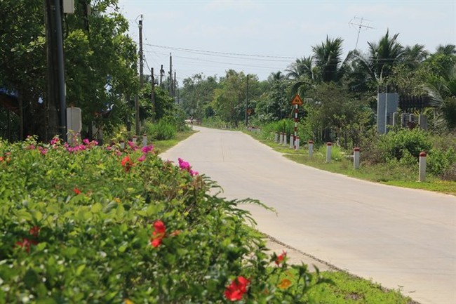 A road has been cemented and beautified in Dinh Quan district’s Gia Canh commune, Dong Nai province.(Photo: VNA)
