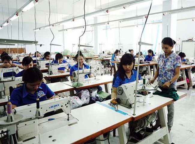 Students of Ninh Thuan vocational school during a sewing class