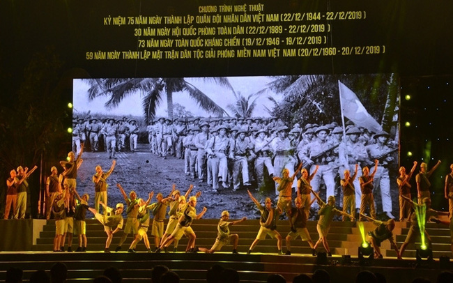 Artists perform during an art programme marking the 75th anniversary of the VPA in Ho Chi Minh City on December 21.