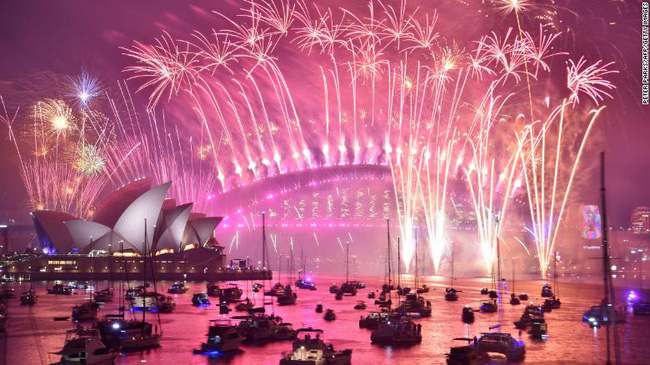 New Year's Eve fireworks erupt over Sydney's iconic Harbour Bridge and Opera House during the fireworks show on January 1, 2019 (Photo: CNN)