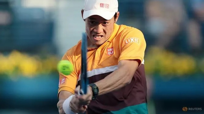 Japan's Kei Nishikori in action during his first round match against Benoit Paire of France. (Reuters)