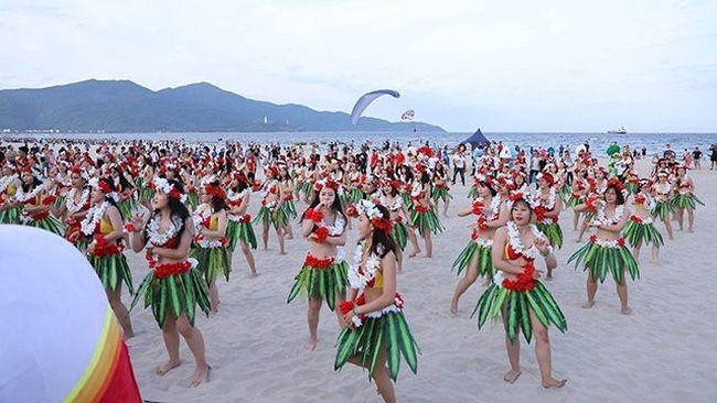 The programme opens with a bikini flashmob on Da Nang beach