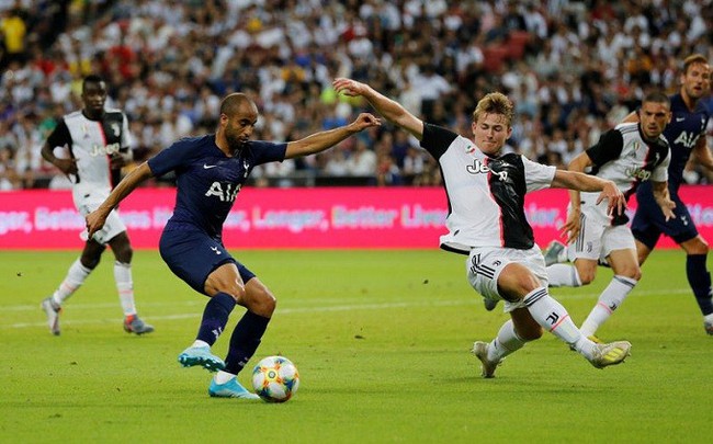 Players of Tottenham and Juventus in action during their match in Singapore on Sunday. (Reuters)