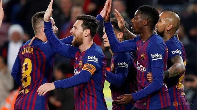 Barcelona's Ousmane Dembele celebrates scoring their second goal with team mates. (Reuters)