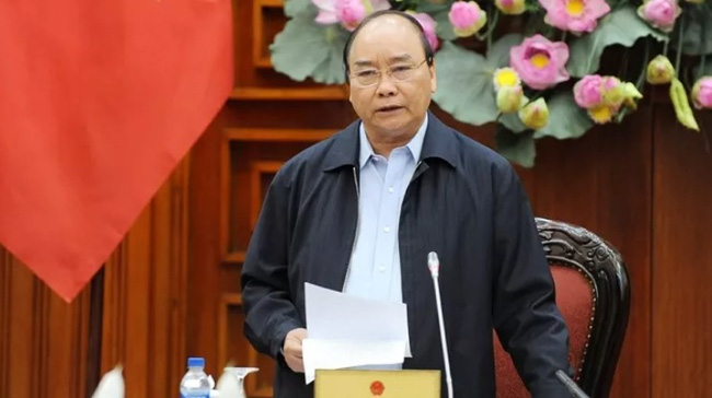 PM Nguyen Xuan Phuc speaks at the working session. (Photo: NDO/Tran Hai)