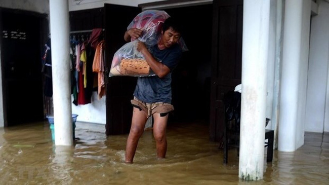 Severe flooding triggered by torrential rain has caused great losses in human and assets in the central region (Photo: VNA)