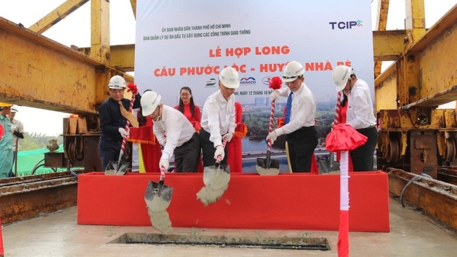 At the ceremony to install the final segment of the Phuoc Loc Bridge.