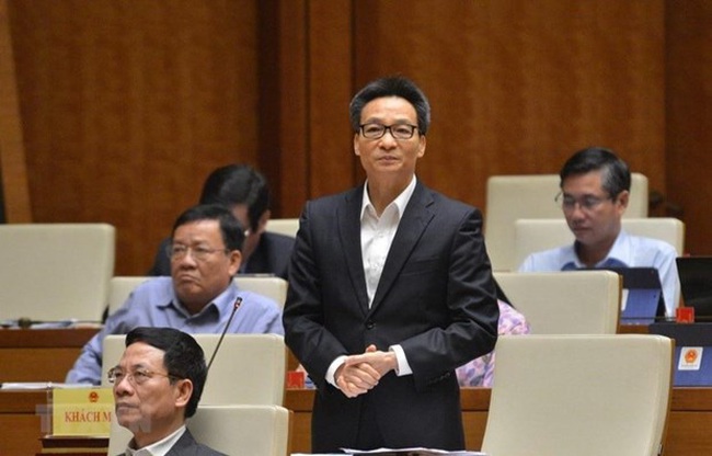 Deputy Prime Minister Vu Duc Dam and seven ministers clarified the issues of deputies’ concern during the working sessions on socio-economic matters and State budget. (Photo: VNA)