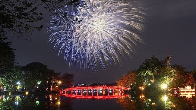 Fireworks explode over Hoan Kiem Lake in central Hanoi to welcome the year of the rat.