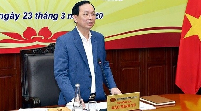 SBV Deputy Governor Dao Minh Tu speaks at the conference.