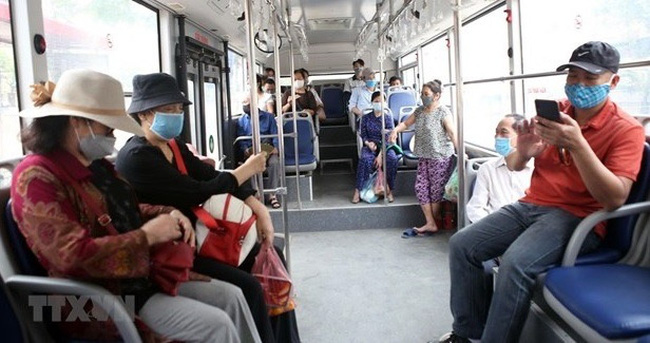 On a bus in Hanoi (Photo: VNA)