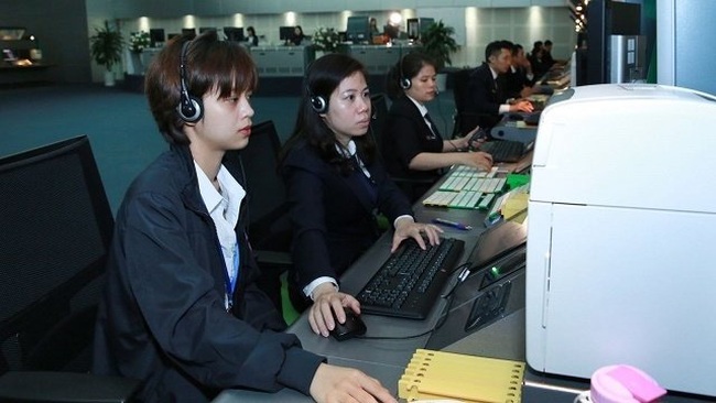 Air traffic controllers working at Hanoi Area Control Centre