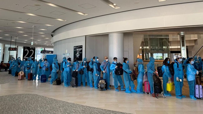 Vietnamese citizens arrive at the Da Nang International Airport.