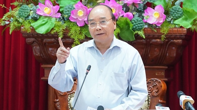 Prime Minister Nguyen Xuan Phuc speaks at the meeting. (Photo: VGP)