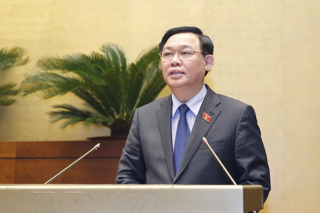 NA Chairman Vuong Dinh Hue addresses the event. (Photo: VNA)