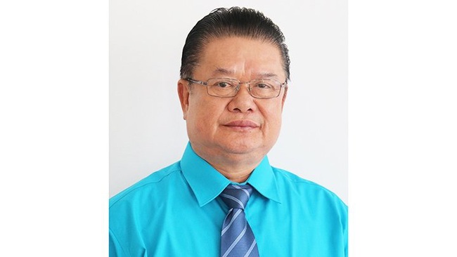 Chairman of the Vietnamese Association in Vientiane Le Van Mui
