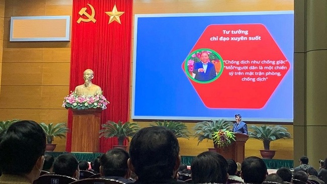 Minister of Health Nguyen Thanh Long reports on the results of the medical sector's activities in 2020 at the National Health Conference in Hanoi on January 6, 2021. (Photo: NDO)