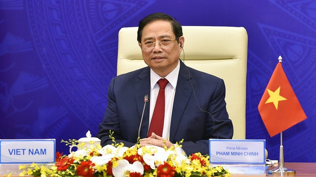 Prime Minister Pham Minh Chinh speaking at the virtual conference (Photo: VGP)