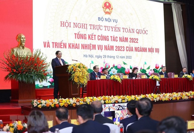Prime Minister Pham Minh Chinh speaks at the conference held by the Ministry of Home Affairs in Hanoi on December 29. (Photo: VNA)