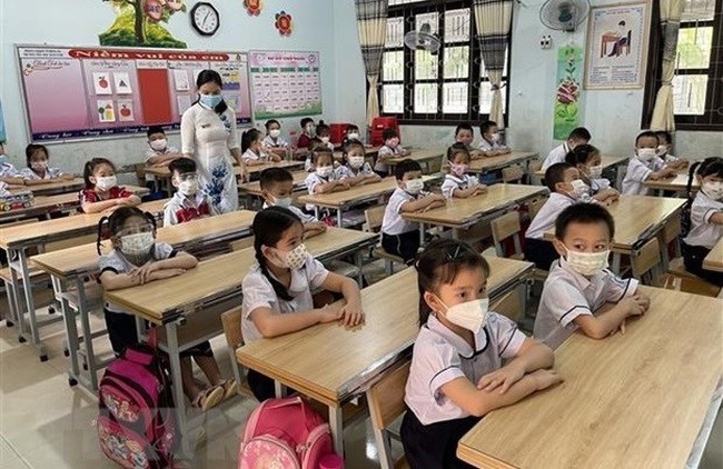 Kindergartens and primary schools in HCM City resume in-person classes on February 14. (Photo: VNA)