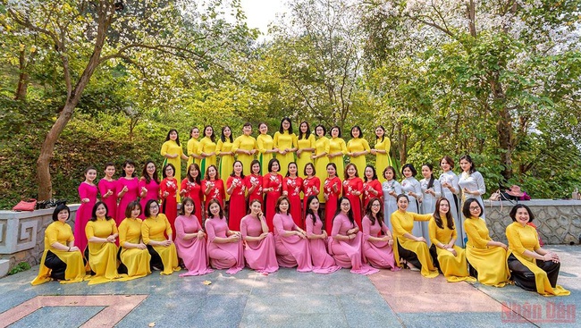 Women of Dien Bien Province's Department of Natural Resources and Environment in bright-coloured ao dai (Photo: Thanh Dat)