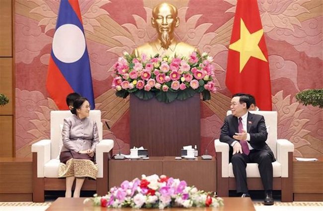 National Assembly Chairman Vuong Dinh Hue on April 26 hosted a reception for Vice President of Laos Pany Yathotou . (Photo: VNA)