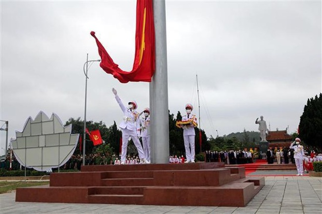 At the flag-hosting ceremony (Photo: VNA)
