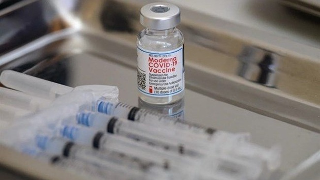 A vial of Moderna COVID-19 vaccine.