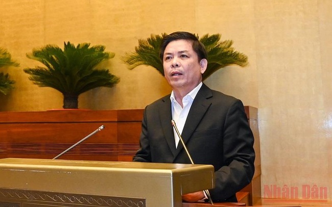 Minister of Transport Nguyen Van The speaking at the ongoing NA session (Photo: NDO)