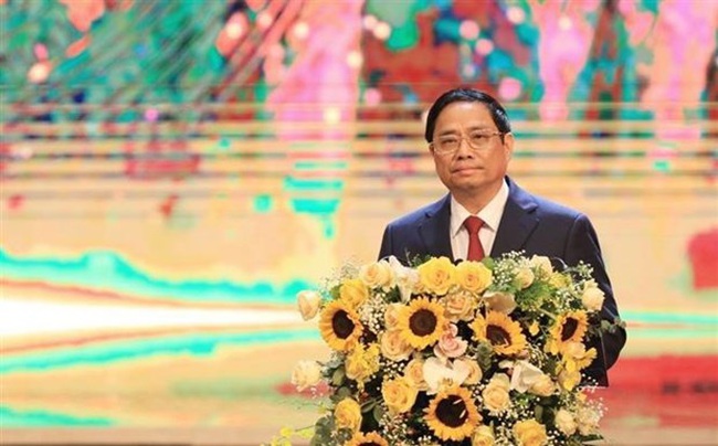 Prime Minister Pham Minh Chinh speaks at the award ceremony. (Photo: VNA)