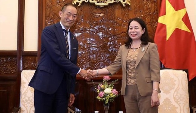 Vice President Vo Thi Anh Xuan and WHO Regional Director for the Western Pacific Takeshi Kasai at the meeting in Hanoi on July 15 (Photo: VNA)