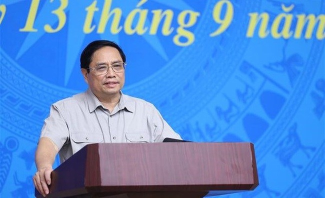 Prime Minister Pham Minh Chinh addresses the meeting (Photo: VNA)
