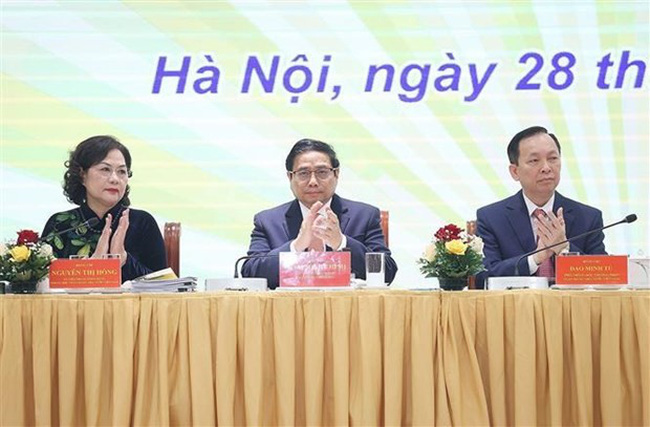 Prime Minister Pham Minh Chinh at the conference held by the central bank. (Photo: VNA)