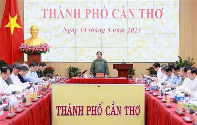PM Pham Minh Chinh speaks at the meeting with Can Tho leaders on May 14. (Photo: VNA)